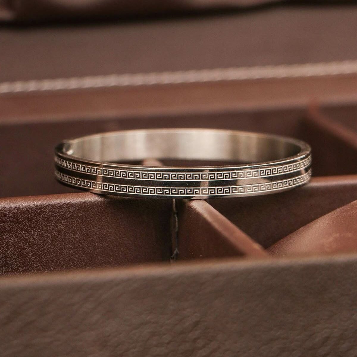 a close shot of Steel kada/bracelet that is a new fashion accessory added to men's fashion to wear on wrist