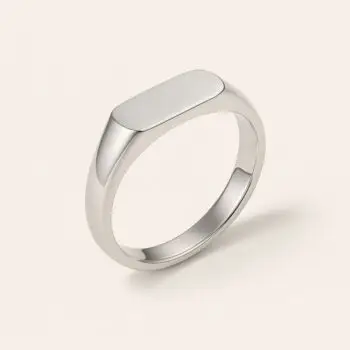 A simple silver signet ring with a smooth, rectangular flat top, shown on a neutral background.