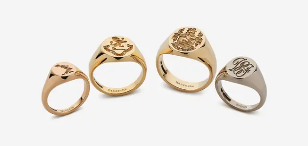 Three rings with varying designs, each showcasing unique patterns and styles, emphasizing their individual artistry.